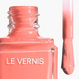Chanel Le Vernis Longwear Nail Colour in Party Girl, open bottle with brush applicator showing coral-pink varnish