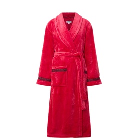 DKNY red fleece robe with shawl collar, tie belt, and contrast trim detail at cuffs and hem