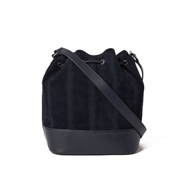 Jigsaw navy suede bucket bag with leather base, gunmetal drawstring hardware, and adjustable crossbody strap