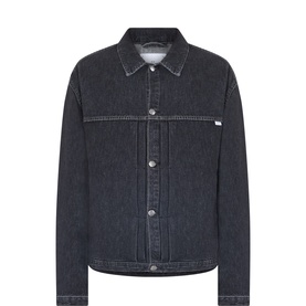 Edwin black denim casual jacket with spread collar, button front, chest seam detail and small logo tab at hem