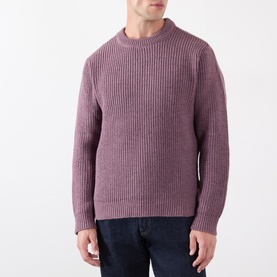 Model wearing Edwin Crew Neck jumper in Grape Nectar, ribbed knit texture, styled with dark indigo jeans.