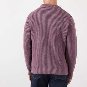 Model wearing Edwin Crew Neck jumper in Grape Nectar, chunky ribbed knit, back view, styled with dark jeans