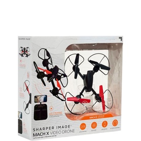 Sharper Image Mach X Video Drone in black and red, shown in packaging with drone and controller visible through box window.
