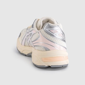 Asics trainer in cream and pink cloud, featuring silver mesh panelling, chunky cream midsole and grey rubber outsole, rear view.