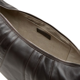 Lemaire dark chocolate leather bag open top view, silver zip fastening and beige fabric lining visible