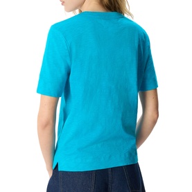 Model wearing Whistles blue short-sleeve T-shirt, rear view, styled with blue jeans.