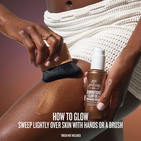 Sol De Janeiro Luminous Glow Oil applied to skin with a brush, showing how-to-glow usage technique