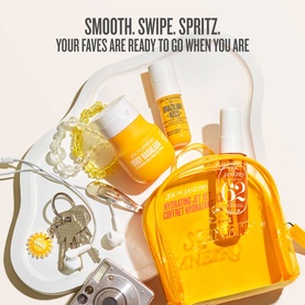 Sol De Janeiro Hydrating Jet Set Cheirosa 62 skincare set in yellow zip pouch with body cream, mist, and accessories flatlay