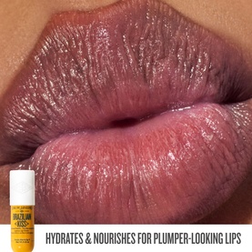 Sol De Janeiro Hydrating Jet Set Cheirosa 62 lip balm stick shown beside a close-up of glossy, plumped lips with a hydrated finish.
