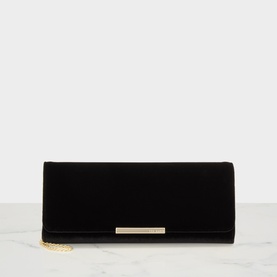 Ted Baker black velvet clutch bag with gold-tone hardware bar detail and detachable chain strap