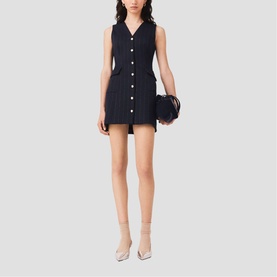 Model wearing Maje Womens French Dress in navy pinstripe mini length with button front detail, styled with nude heels and mini bag