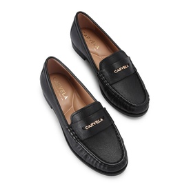 Carvela black leather loafers with gold logo strap detail, moccasin stitching, and flat sole, shown as a pair from above.