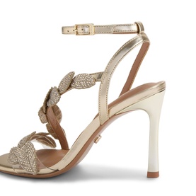 Carvela gold high heel sandal with crystal embellished leaf straps, ankle buckle fastening, and slim stiletto heel
