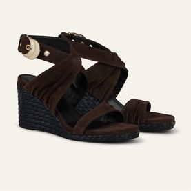 Bash brown suede wedge sandals with crossover fringe straps, gold-tone buckle, and woven espadrille wedge sole