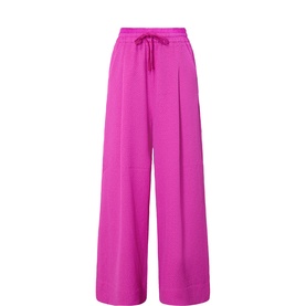 Essentiel Antwerp hot magenta wide-leg trousers with elasticated drawstring waistband and front pleats