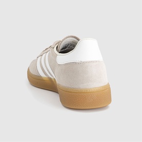 Adidas trainer in khaki and off-white suede, white three-stripe detail, gum rubber sole, rear three-quarter view
