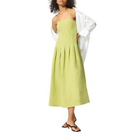 Model wearing Whistles green sleeveless midi dress with pleated skirt, styled with a white oversized jacket and strappy sandals