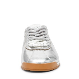Steve Madden silver metallic lace-up trainer with tan gum sole, front-facing view