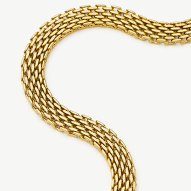 Missoma gold wide woven mesh chain bracelet with panther-link pattern, yellow gold tone finish