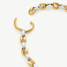 Missoma bracelet in gold and silver two-tone chain links with lobster clasp closure, mixed metal interlocking oval design