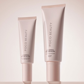 Poco Beauty Universal Solar Glow Sun Care shown in two sizes, pale pink tubes with neutral warm-toned background