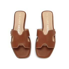 KG by Kurt Geiger beige leather flat slide sandals with H-bar strap detail and contrast stitching, top-down view