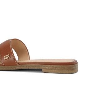 KG by Kurt Geiger beige leather flat slide sandal with single wide strap, white topstitching detail and gold logo hardware, tan flat sole.