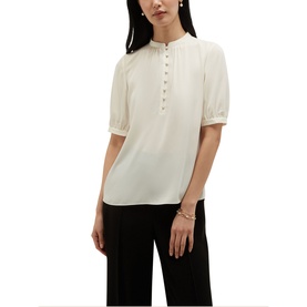 Model wearing Hobbs cream short-sleeve blouse with button placket and ruched cuffs, styled with wide-leg black trousers