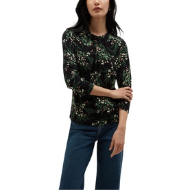 Model wearing Hobbs navy multi floral print three-quarter sleeve top, styled with dark blue jeans