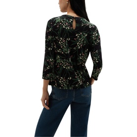 Model wearing Hobbs navy multi floral print top with three-quarter sleeves and keyhole back detail, styled with dark blue jeans
