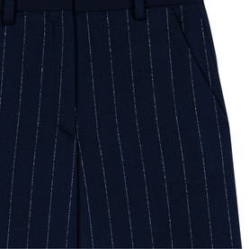 Maje navy blue pinstripe wide-leg trousers with belt loops, close-up detail showing white pinstripe pattern on tailored fabric.