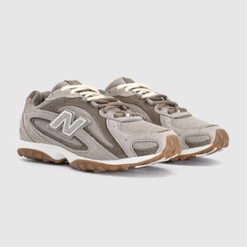 New Balance sneakers in Dark Olivine Gum, suede and mesh upper, silver N logo, chunky gum rubber sole, cream laces