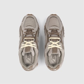 New Balance trainers in Dark Olivine Gum, overhead view showing taupe mesh upper, cream laces and branded insole