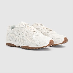 New Balance trainers in Sea Salt Gum, cream leather upper with tonal overlays, chunky gum rubber outsole, lace-up fastening