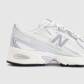 New Balance 530 trainer in Sea Salt and Truffle Salt, white mesh upper with silver N logo, cream midsole with ABZORB cushioning