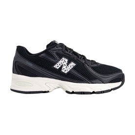 New Balance 740 trainer in black with leopard-print N logo, mesh upper, chunky off-white sole