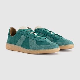 Adidas trainers in active green suede with white stripe detailing, cream laces and gum sole