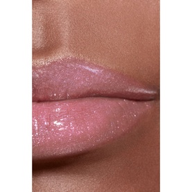 Chanel Lip Gloss shade 432 Cristal worn on lips, showing sheer pink gloss with sparkling shimmer finish