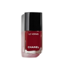 Chanel Le Vernis nail varnish in 421 Cristalline, deep red shade in glass bottle with black cap