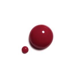 Chanel nail varnish swatch in shade 421 Cristalline, shown as two deep crimson droplets on a white background