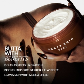 Fenty Skin Amber Bouquet Butta Drop Whipped Oil Body Cream in terracotta jar with white whipped cream texture, held in hand