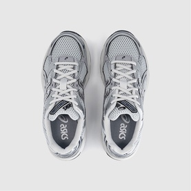 Asics trainers in Glacier Grey and Pure Silver, overhead view showing mesh upper, white laces, and grey rubber sole.
