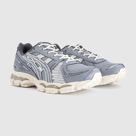 Asics trainers in Piedmont Grey Gravel, mesh and synthetic upper, chunky cream midsole, silver branding, pair angled view