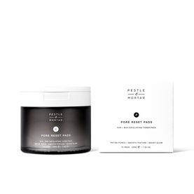 Pestle & Mortar Pore Reset Pads exfoliating toner pads in dark jar shown alongside product box packaging