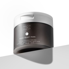 Pestle & Mortar Pore Reset Pads exfoliating toner pads in a dark grey and white lidded jar