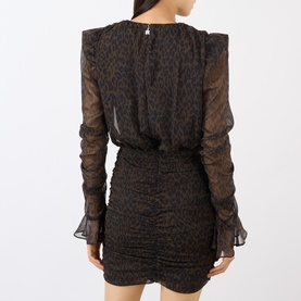 Model wearing Rotate dress in Mole Comb, back view, sheer long sleeves with ruffle cuffs, ruched mini skirt, leopard print