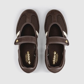 Adidas dark brown mary jane shoes with mesh upper, velcro strap, cream stripe detail and gold Adidas logo, top-down view
