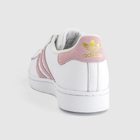 Adidas Superstar trainer in white and clear pink with gold Trefoil logo, shell toe and pink suede heel detail