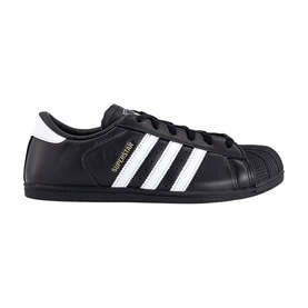 Adidas Superstar trainers in black leather with white three stripes, gold branding, and black shell toe sole