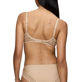 Model wearing Triumph Full Cup Bra in Skin tone, rear view showing lace detailing on back and adjustable straps, styled with matching briefs.